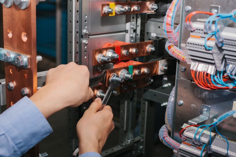 What is the role of a busbar in switchgear?